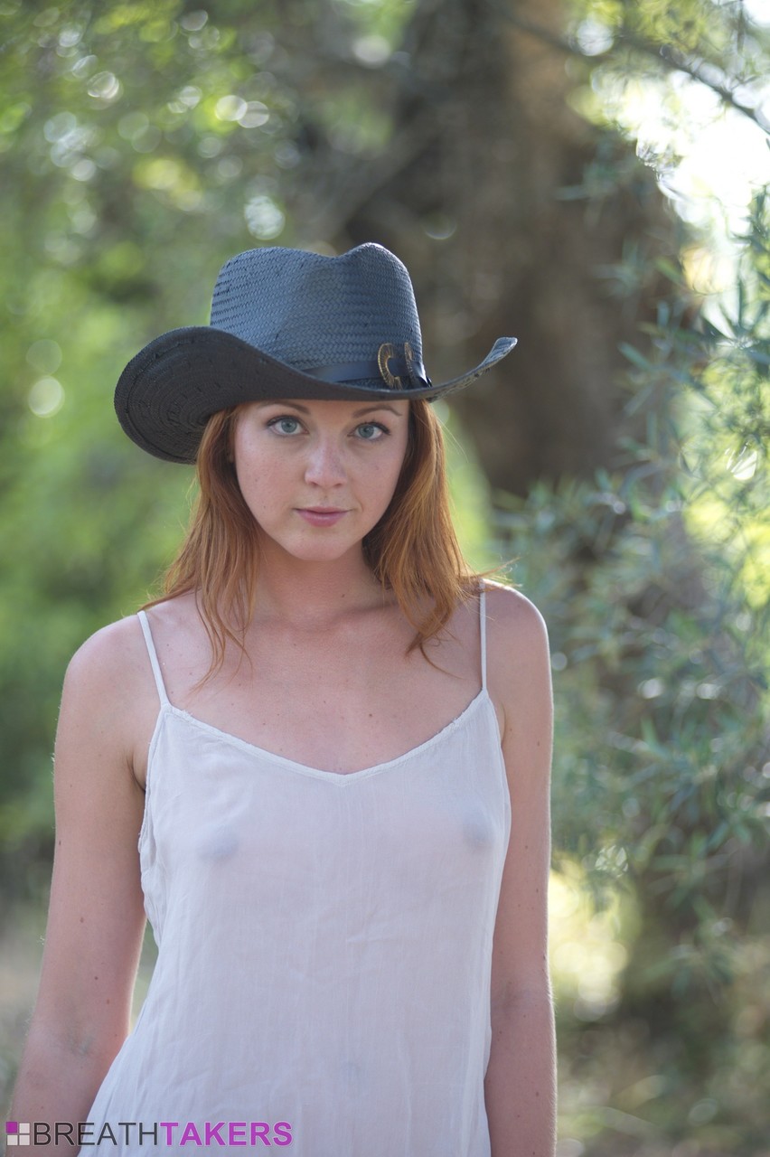 Country girl Elen Moore doffs her cowgirl hat and nightie to pose nude outside Country girl Elen Moore doffs her cowgirl hat and nightie to pose nude outside
