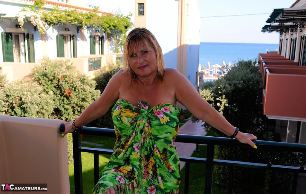 Slutty mature nudist with large tits Chrissy shows her hot curves at the beach Slutty mature nudist with large tits Chrissy shows her hot curves at the beach