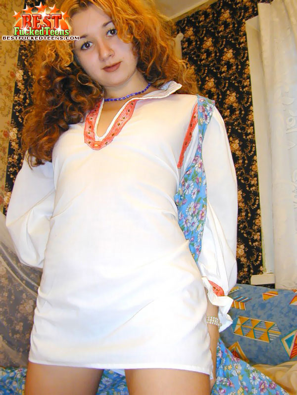 Young looking Russian girl with red hair stretches her wet pussy wide open Young looking Russian girl with red hair stretches her wet pussy wide open